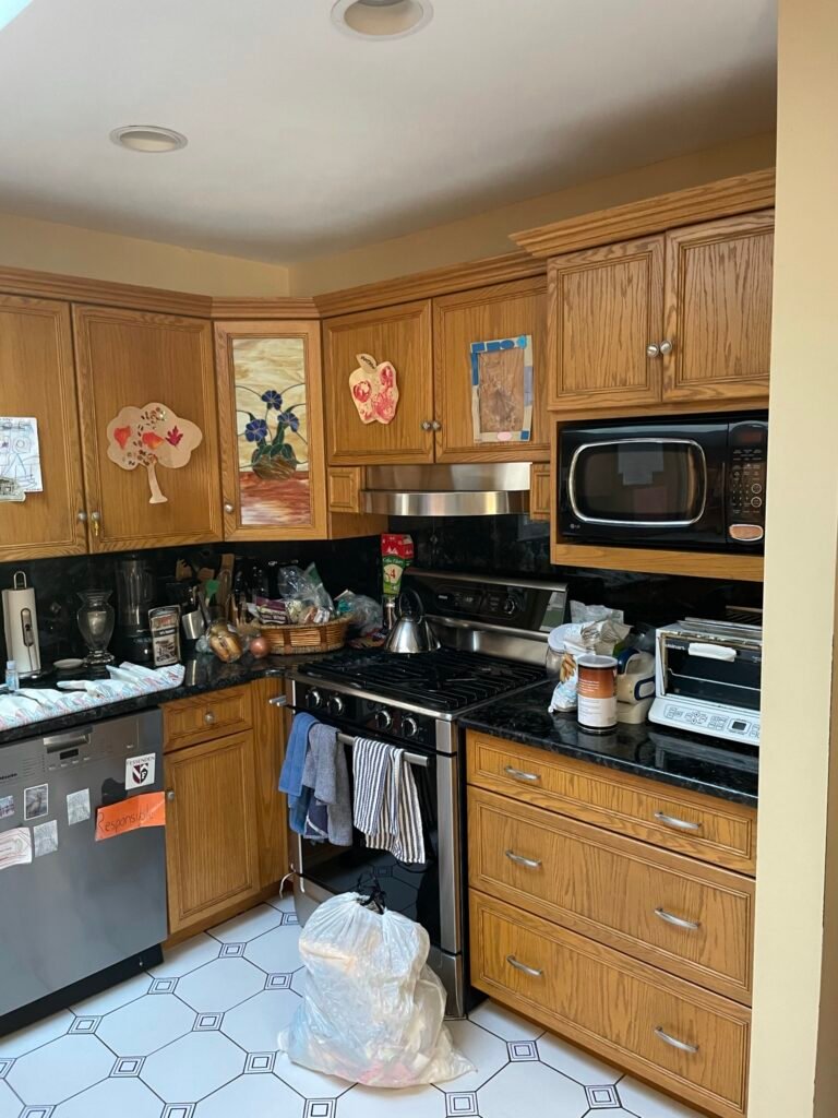 Kitchen interior in a Wakefield, MA area home before interior painting by GF Painting Services