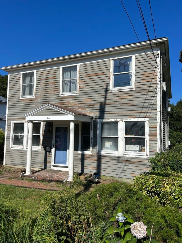 Gray two-story colonial house exterior painted by GF Painting Services in the Wakefield, MA area